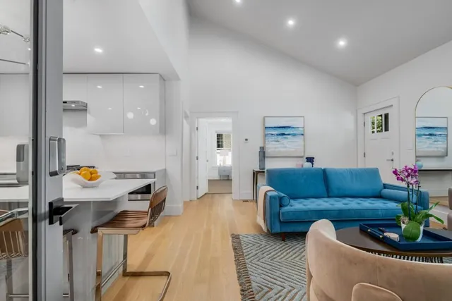 a living room with furniture and a table