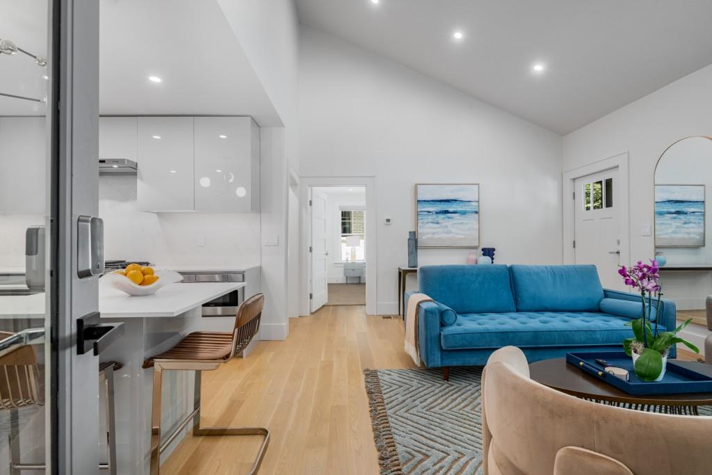 413 8th Street Northeast, Unit A Atlanta, GA 30309 - Photo 5 of 31 a living room with furniture and a table