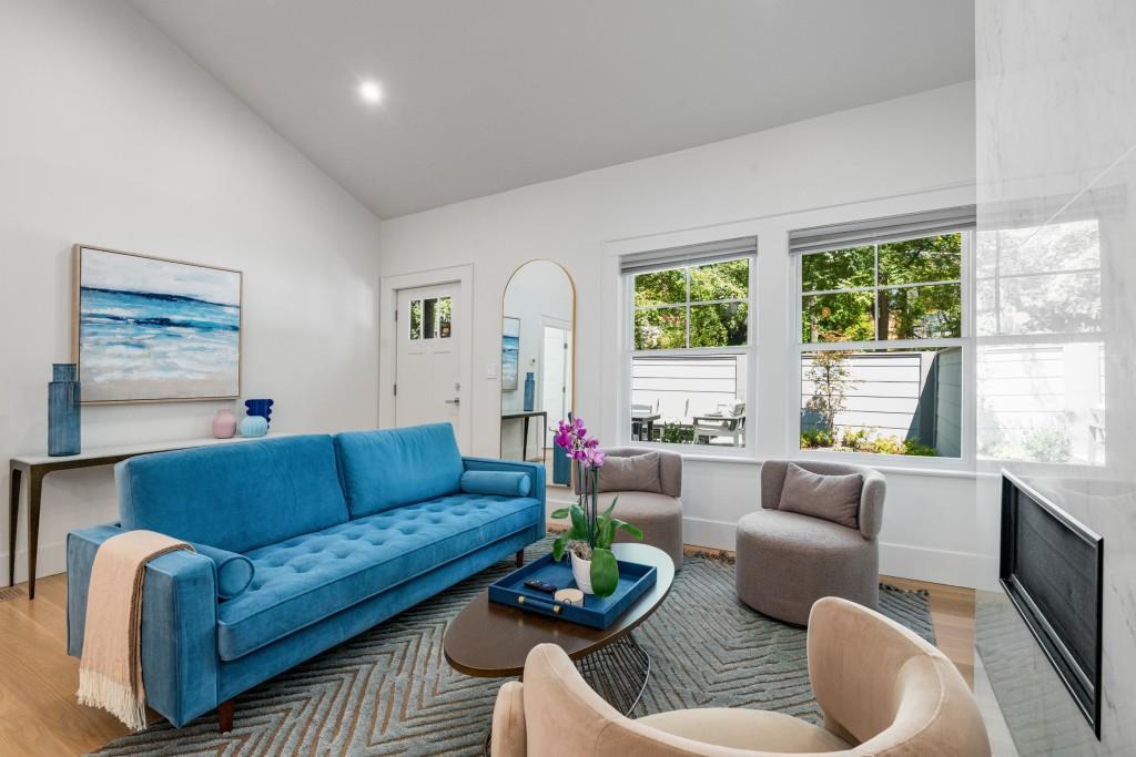413 8th Street Northeast, Unit A Atlanta, GA 30309 - Photo 6 of 31 a living room with furniture and a large window