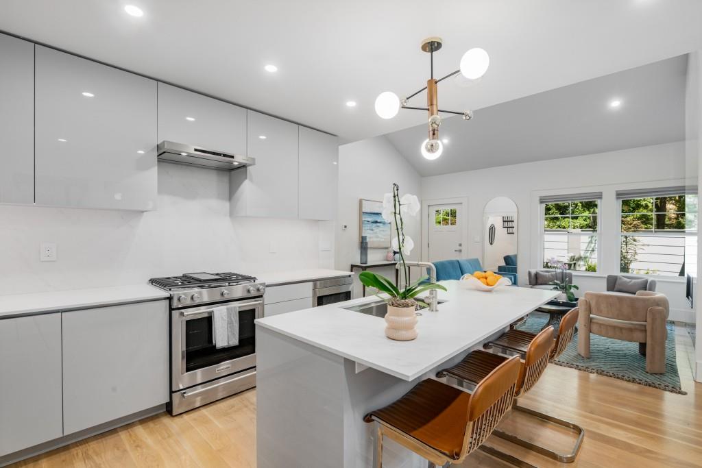 413 8th Street Northeast, Unit A Atlanta, GA 30309 - Photo 7 of 31 a view of a dining room with furniture and wooden floor