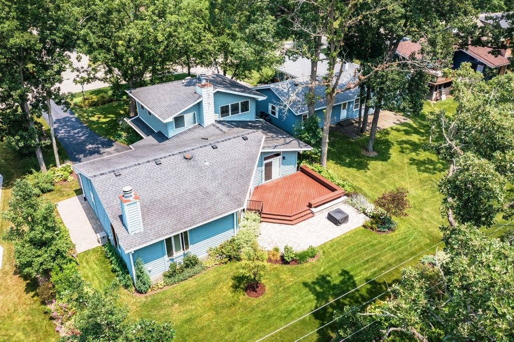 345 Dunbar Road Mundelein, IL 60060 - Photo 3 of 35 an aerial view of a house with yard swimming pool and outdoor seating