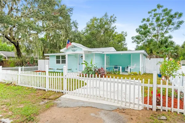 front view of a house with a small yard