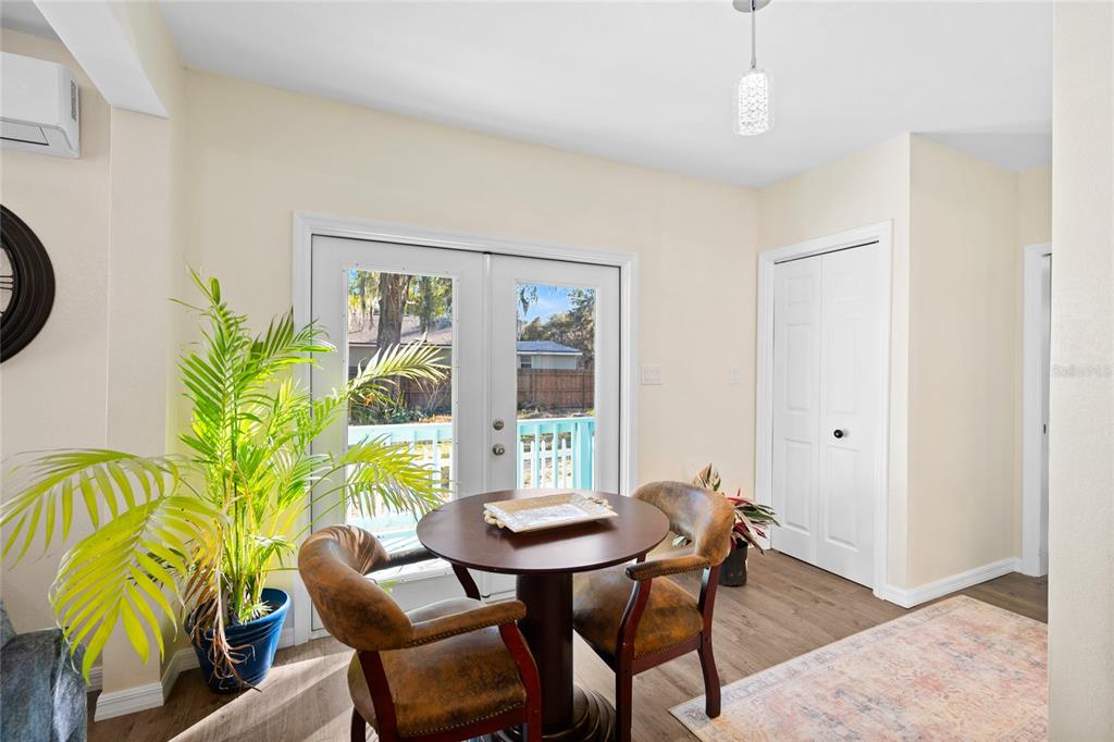 245 South Rhodes Street Mount Dora, FL 32757 - Photo 15 of 64 a view of a dining room with furniture and window