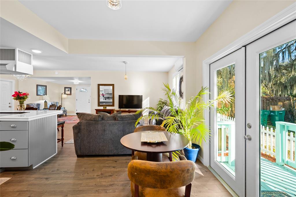 245 South Rhodes Street Mount Dora, FL 32757 - Photo 16 of 64 a living room with furniture and a flat screen tv