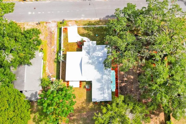 a view of swimming pool with a yard
