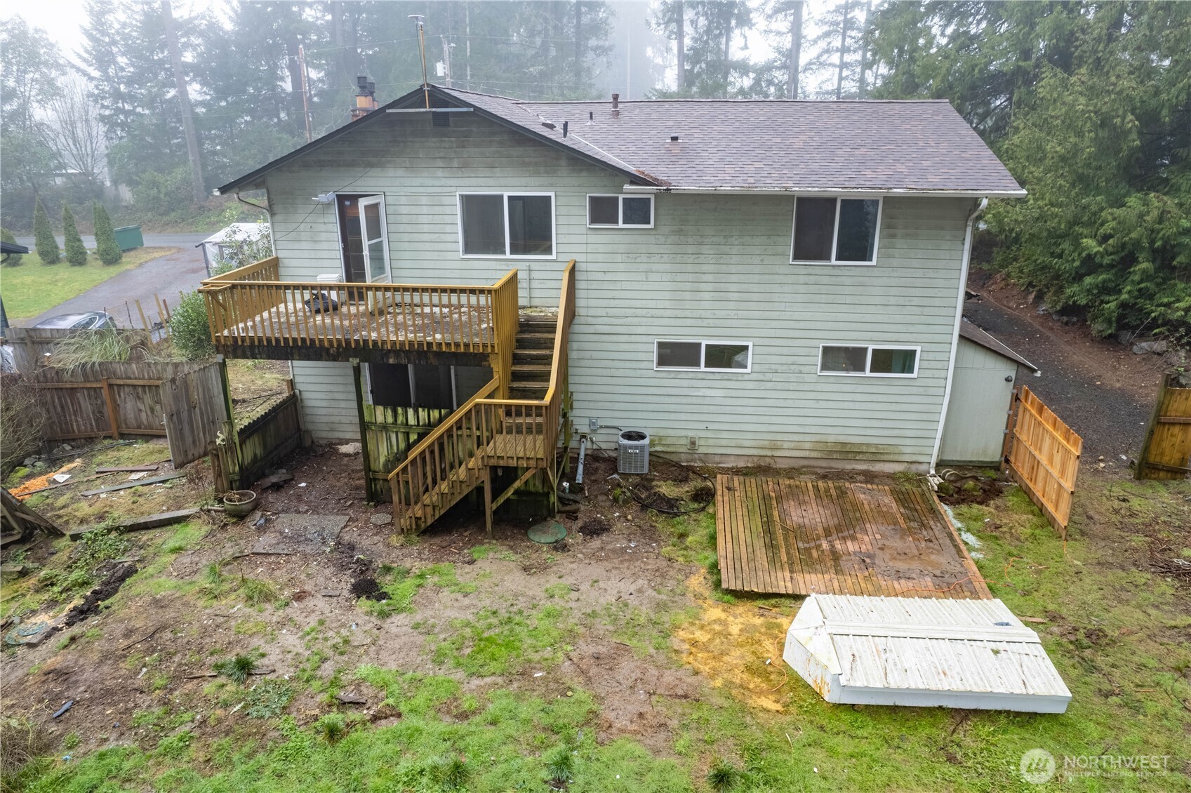 5189 Brasch Road Southeast Port Orchard, WA 98367 - Photo 23 of 24 a view of a house with a yard