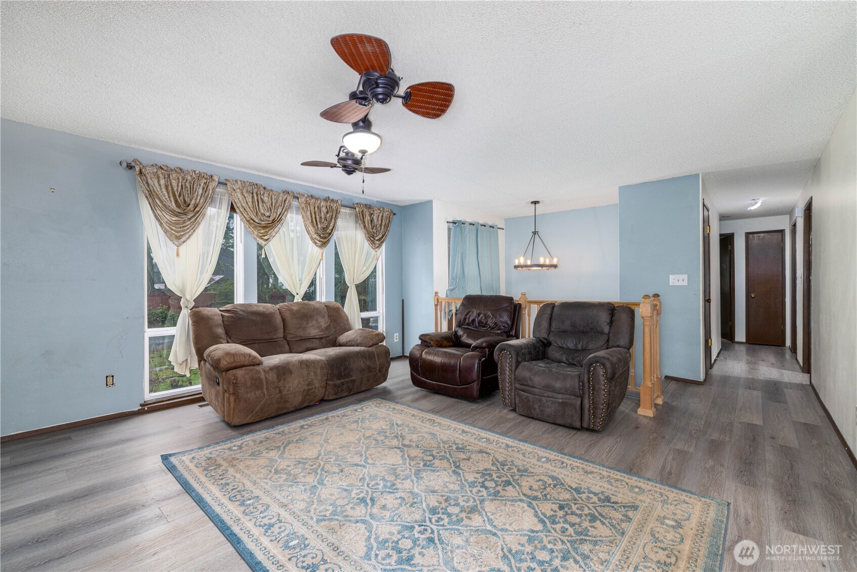 5189 Brasch Road Southeast Port Orchard, WA 98367 - Photo 4 of 24 a living room with furniture and a rug