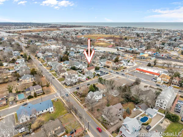 an aerial view of residential building with parking space