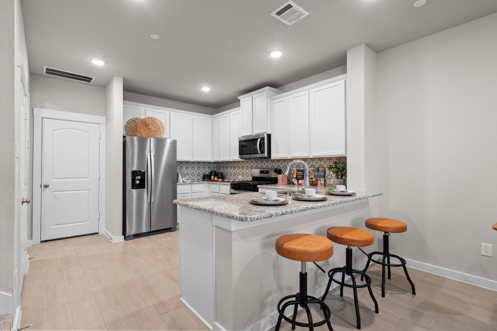 2778 Mariposa Crk Drive, Unit 2 Rosharon, TX 77583 - Photo 5 of 30 This kitchen isn’t just a place to cook; it’s a space where memories are made, where family traditions thrive, and where you can feel truly at home.