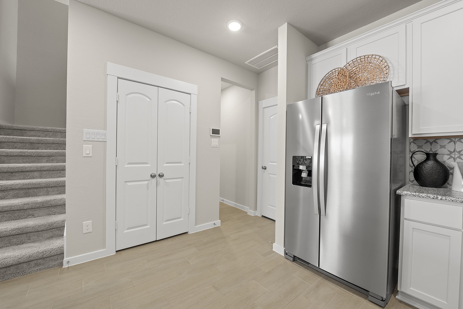 2778 Mariposa Crk Drive, Unit 2 Rosharon, TX 77583 - Photo 8 of 30 The stairway is tucked away, to not disrupt the open flow of this home.