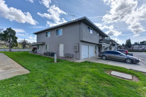 a house view with a garden space
