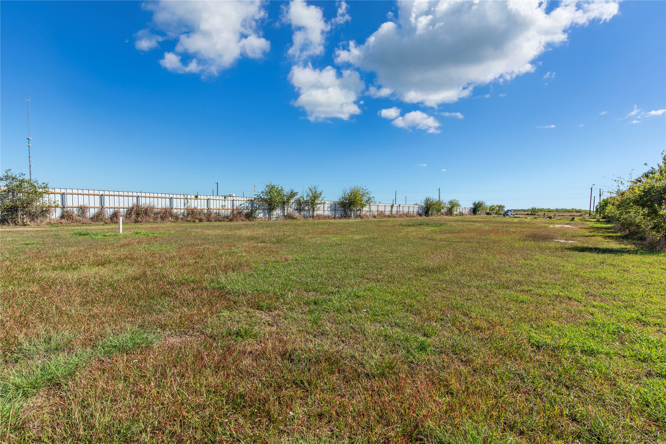 399 South Gulf Road Bay City, TX 77414 - Photo 8 of 18 a view of a ocean with a building in the background