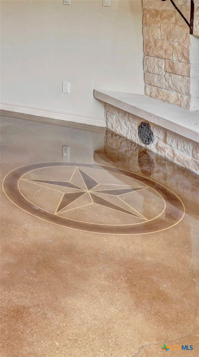 210 Center Point Drive Center Point, TX 78010 - Photo 21 of 44 1 of 2 Stars etched into concrete floor