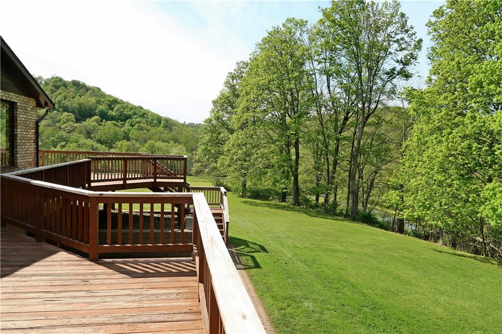 388 Bortz Road Saltsburg, PA 15681 - Photo 36 of 50 Fabulous 50x36 Wrap around DECK featuring Amazing Seasonal Views!
