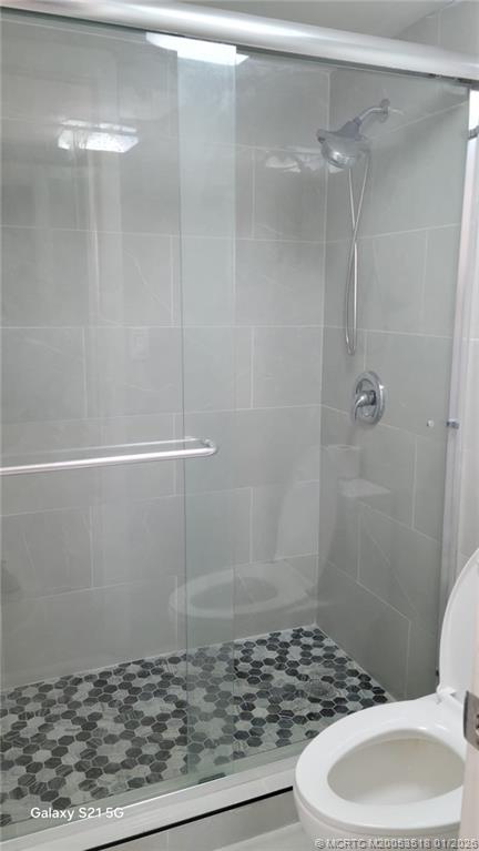 13715 Southwest 66th Street, Unit 415 Miami, FL 33183 - Photo 11 of 20 a bathroom with a shower
