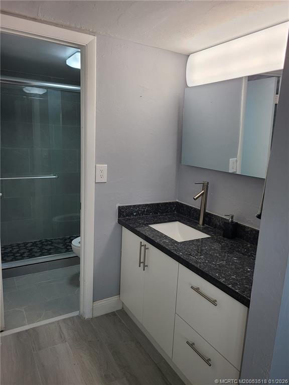 13715 Southwest 66th Street, Unit 415 Miami, FL 33183 - Photo 12 of 20 a kitchen with a sink and cabinets