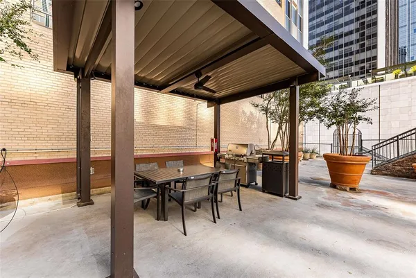a view of a balcony with chairs