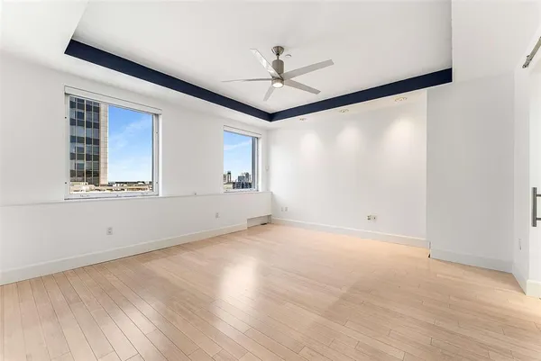 a view of a balcony and a floor to ceiling window