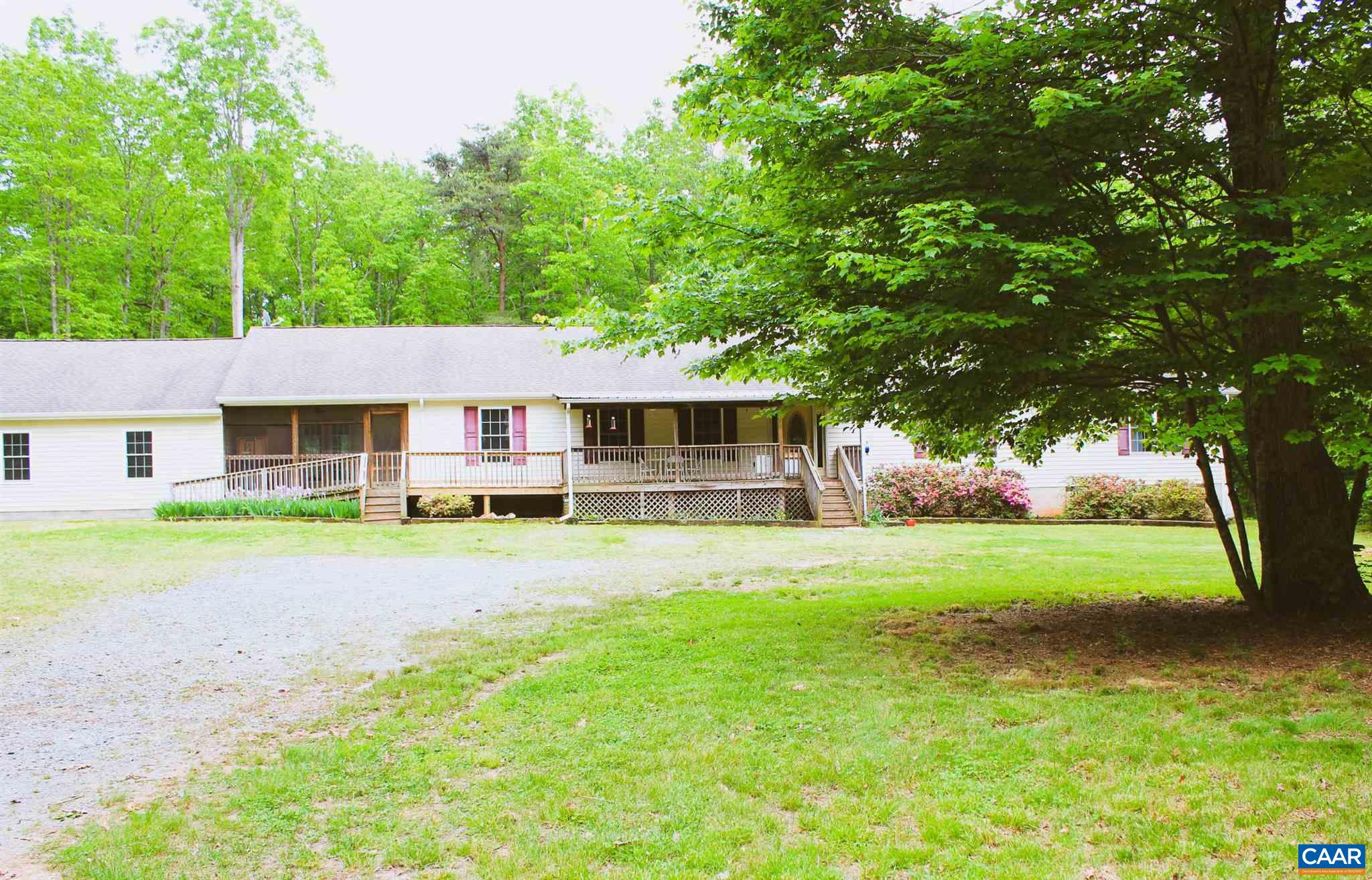 3205 Community House Road Columbia, VA 23038 - Photo 1 of 14 front view of a house with a yard