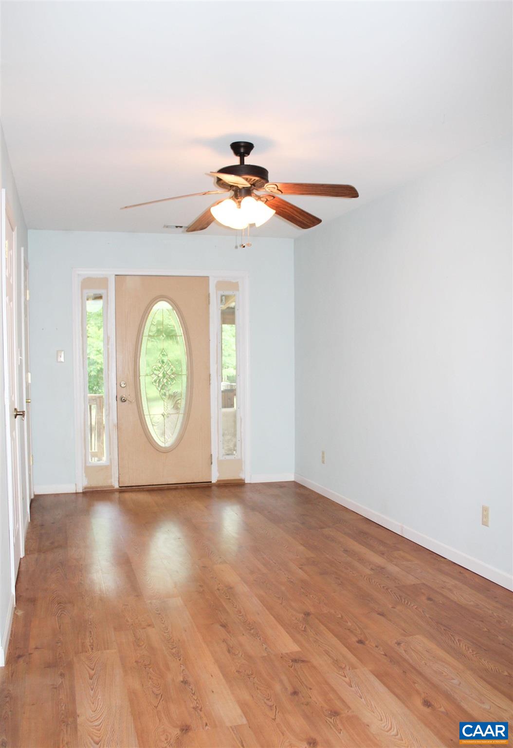 3205 Community House Road Columbia, VA 23038 - Photo 5 of 14 a view of a clock on the wall