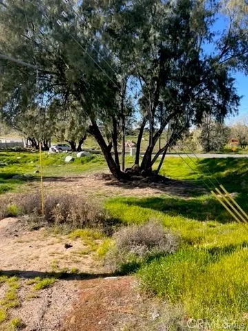 a view of a lake with a big yard