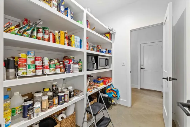 a bedroom with furniture and window