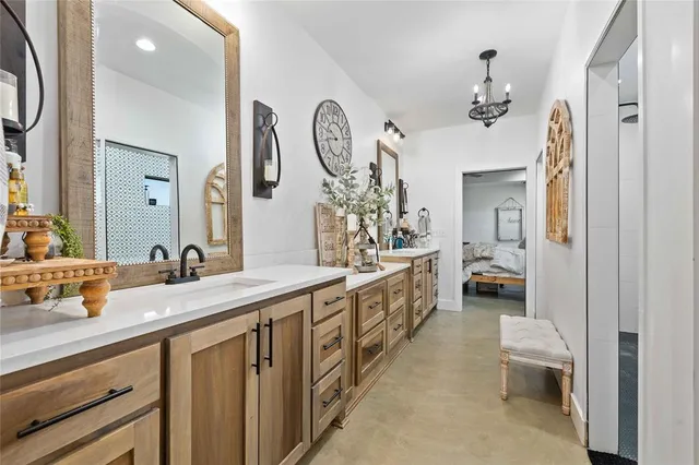 a bedroom with a bed and a table in it