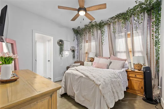 a bathroom with a sink a mirror a bathtub and shower