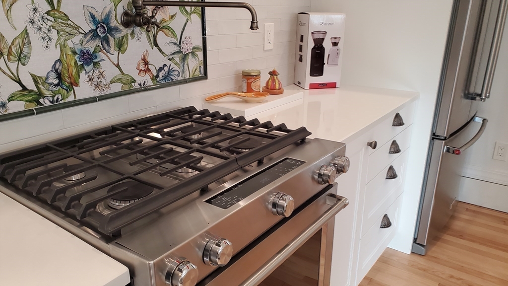 68 Clark Street Worcester, MA 01606 - Photo 16 of 42 a close view of a stove in the kitchen