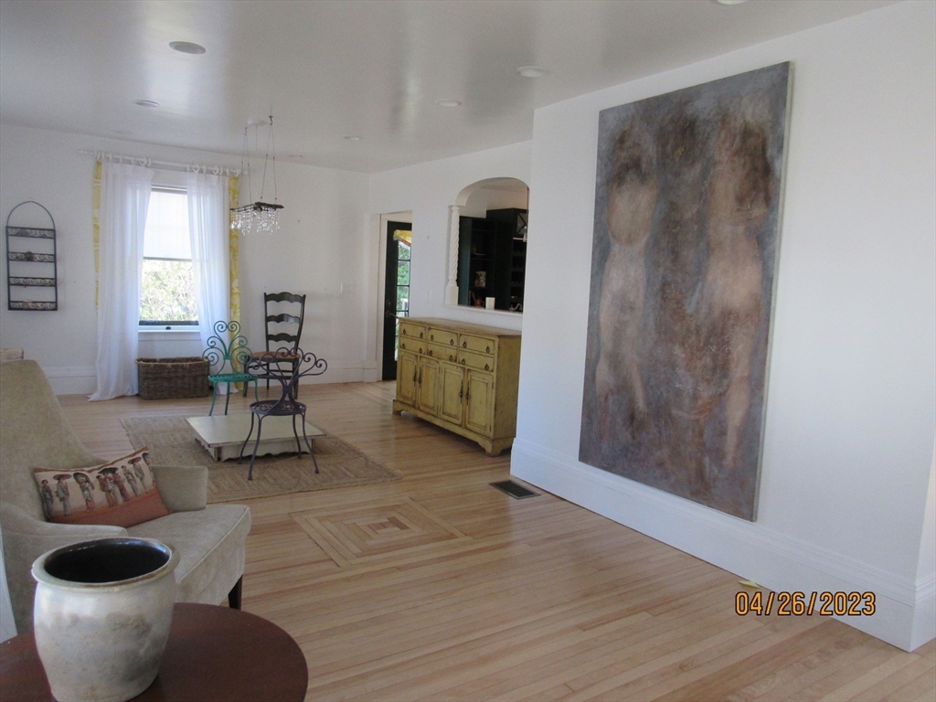 68 Clark Street Worcester, MA 01606 - Photo 24 of 42 a living room with furniture and a potted plant