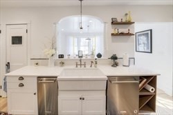 68 Clark Street Worcester, MA 01606 - Photo 10 of 42 a bathroom with a sink a mirror and shower
