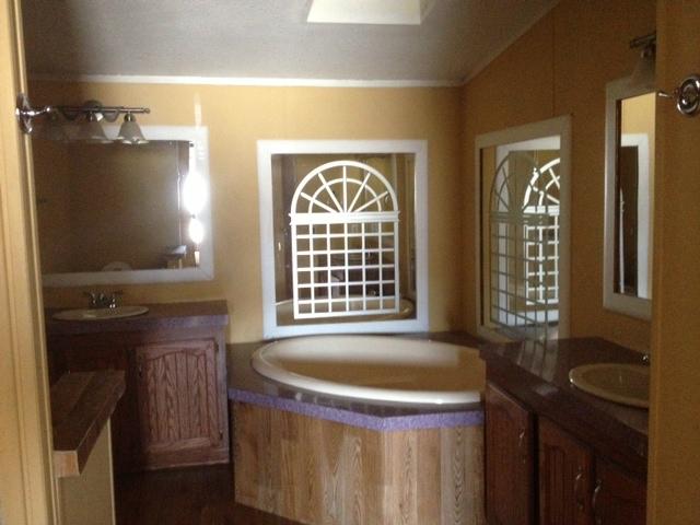 402 Ribbon Branch Road Dover, TN 37058 - Photo 13 of 15 Master bath with garden tub and seperate showers.