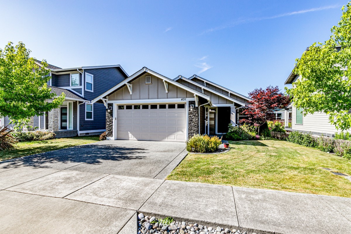 431 Lofgrin Road Sequim, WA 98382 - Photo 1 of 35 a front view of a house with a yard