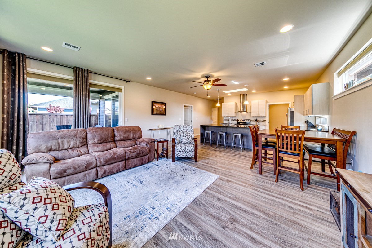 431 Lofgrin Road Sequim, WA 98382 - Photo 17 of 35 a living room with furniture and wooden floor