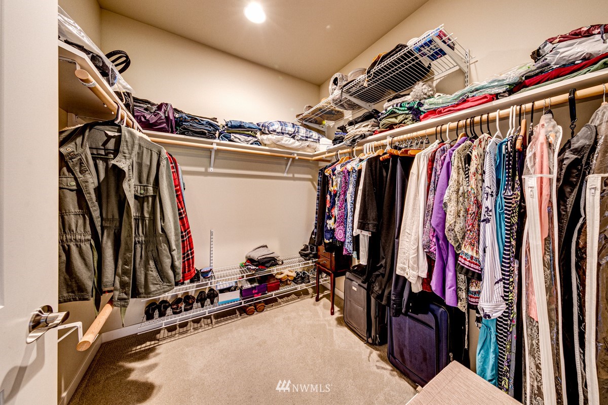 431 Lofgrin Road Sequim, WA 98382 - Photo 24 of 35 a view of walk in closet with clothes and shoes
