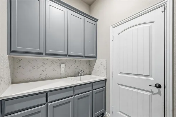 a view of cabinets with wooden floor
