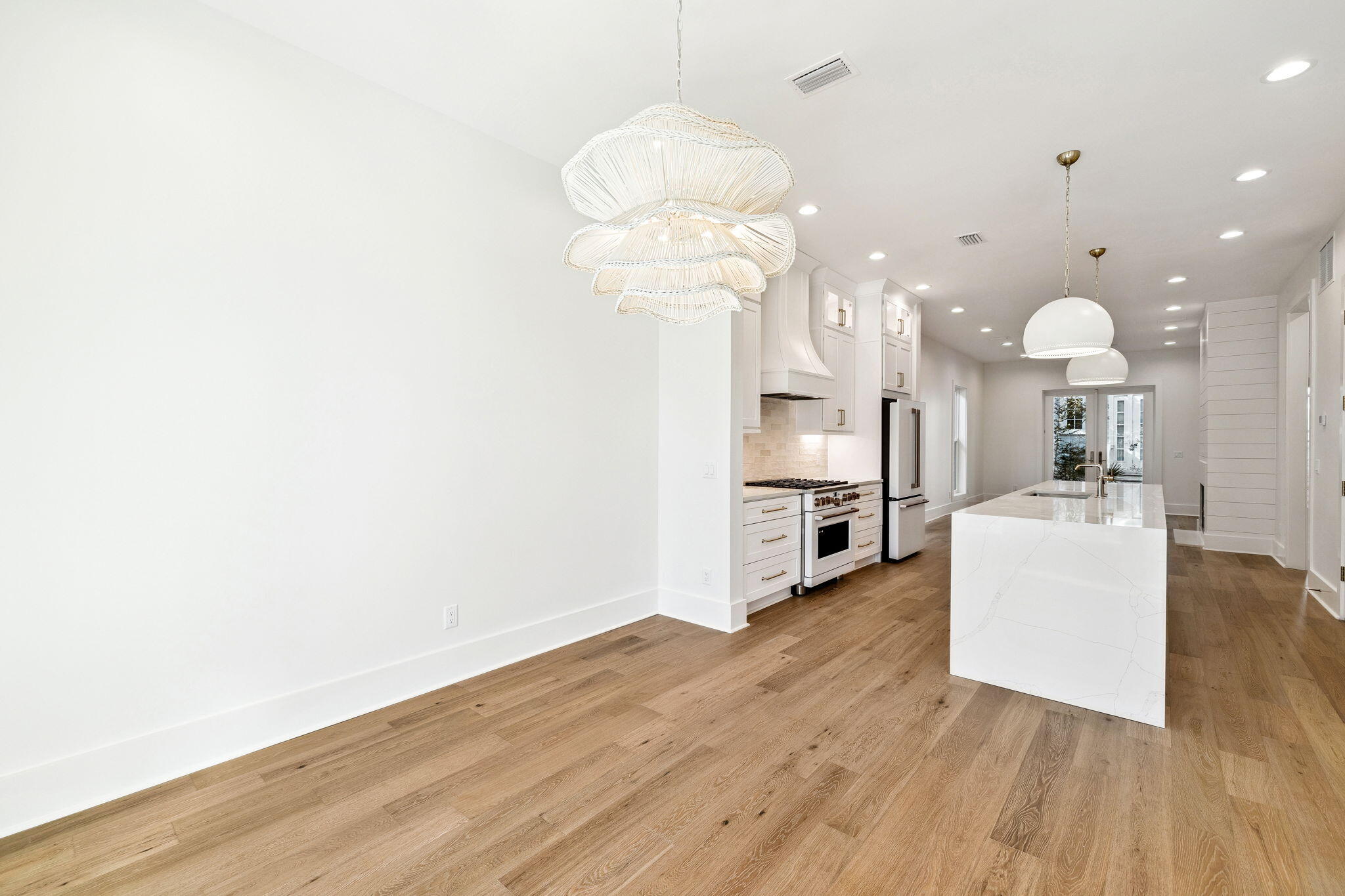 141 Grande Pointe Dr Inlet Beach Inlet Beach, FL 32461 - Photo 19 of 64 a view of a kitchen with furniture and wooden floor