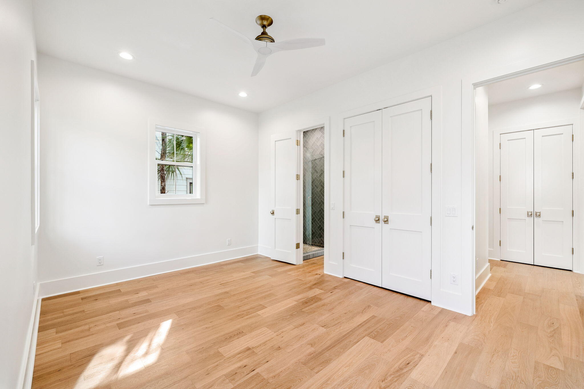 141 Grande Pointe Dr Inlet Beach Inlet Beach, FL 32461 - Photo 23 of 64 a view of an empty room with wooden floor and a window