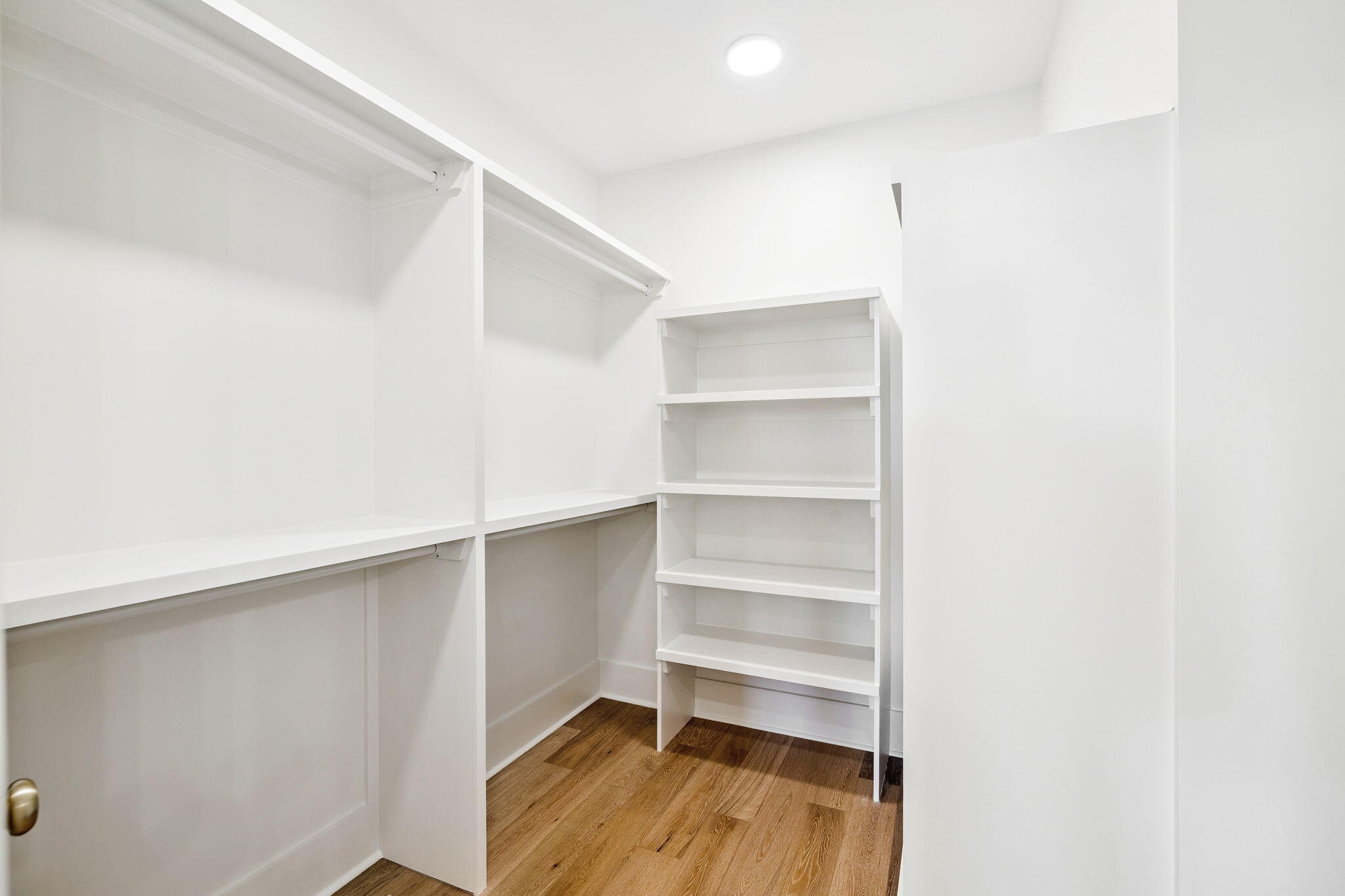 141 Grande Pointe Dr Inlet Beach Inlet Beach, FL 32461 - Photo 32 of 64 a view of walk in closet with empty racks