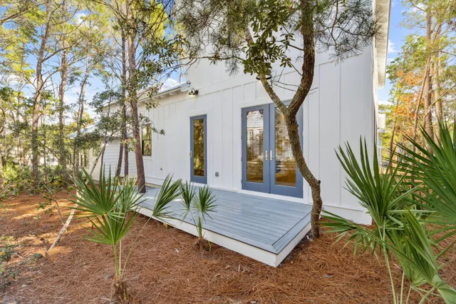 a view of walk in closet with clothes