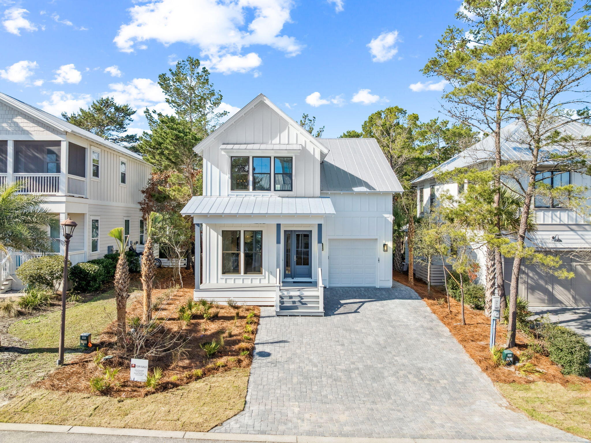 141 Grande Pointe Dr Inlet Beach Inlet Beach, FL 32461 - Photo 51 of 65 a front view of a house with entertaining space