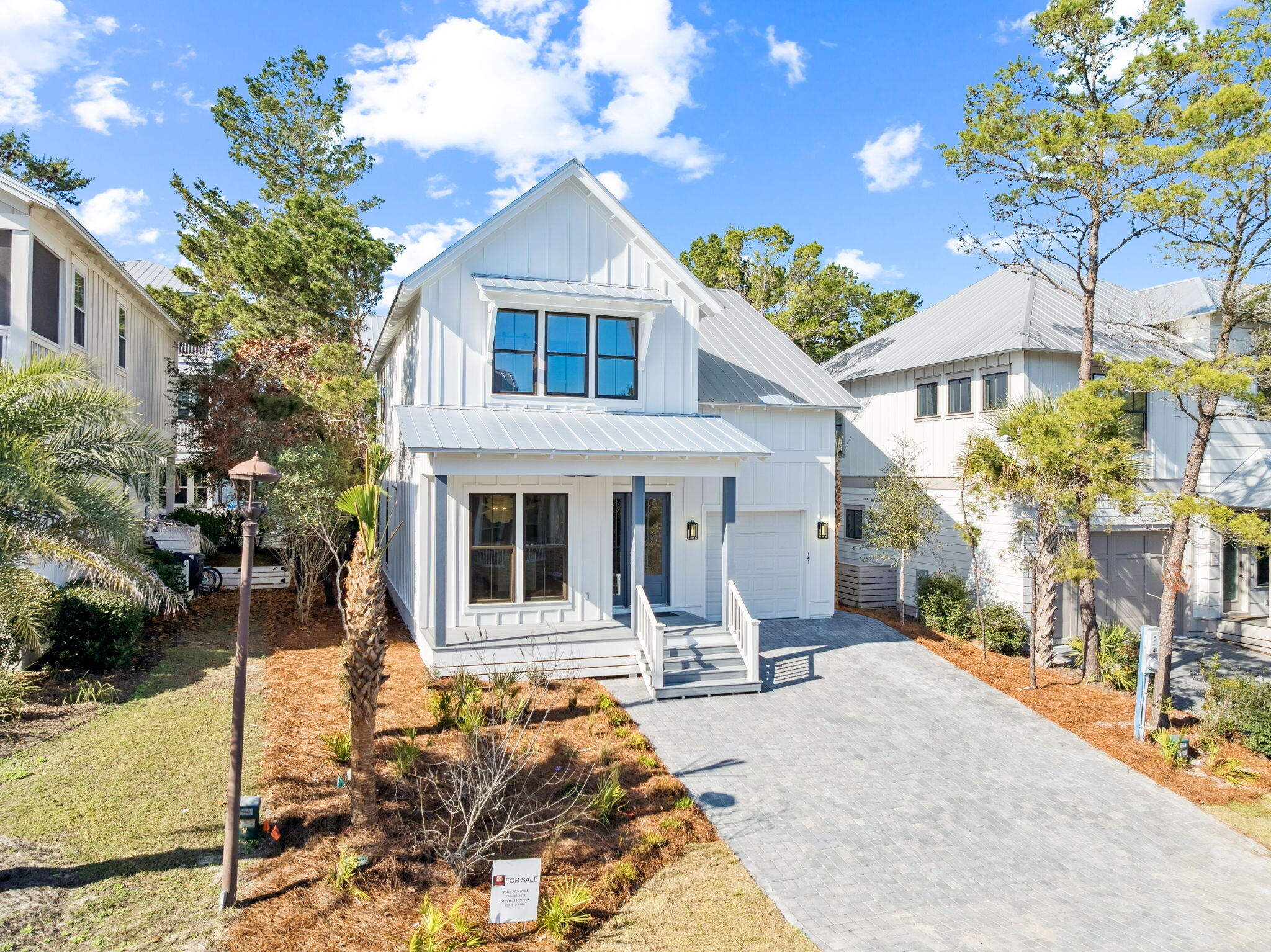 141 Grande Pointe Dr Inlet Beach Inlet Beach, FL 32461 - Photo 52 of 65 a front view of a house with a porch