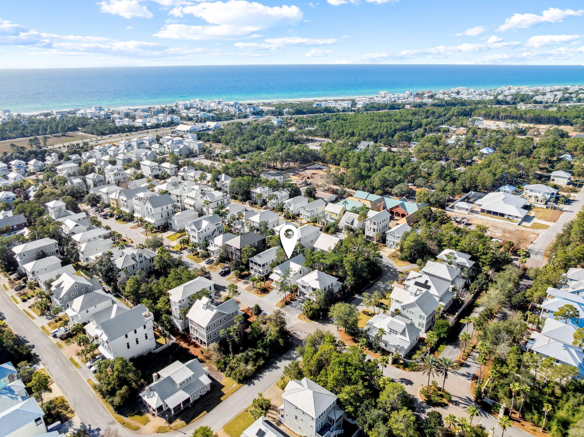 141 Grande Pointe Dr Inlet Beach Inlet Beach, FL 32461 - Photo 58 of 65 an aerial view of a city with lots of residential buildings