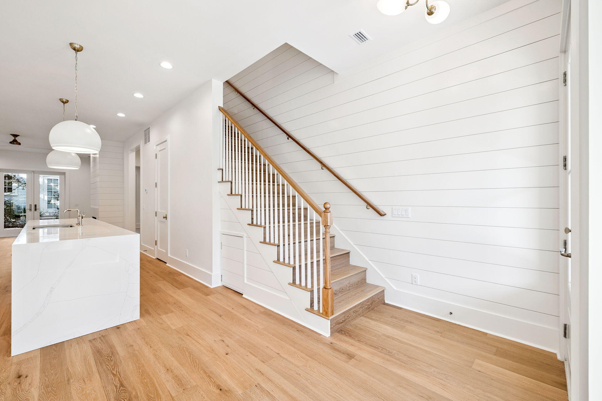 141 Grande Pointe Dr Inlet Beach Inlet Beach, FL 32461 - Photo 8 of 64 a view of a hallway with stairs and wooden floor