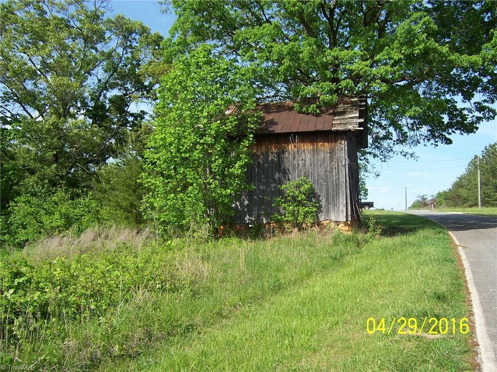 1-acre High Ridge Road Mount Airy, NC 27030 - Photo 9 of 13 An old tobacco barn near the corner of the lot.