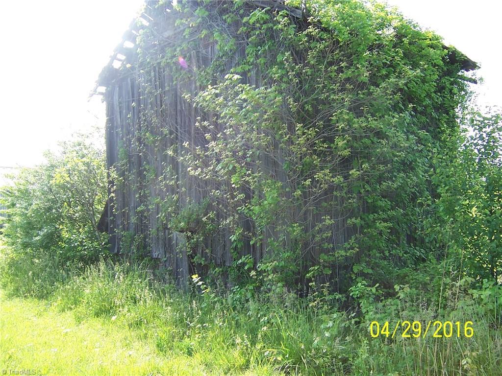 1-acre High Ridge Road Mount Airy, NC 27030 - Photo 10 of 13 A tobacco barn near the front corner of the lot.