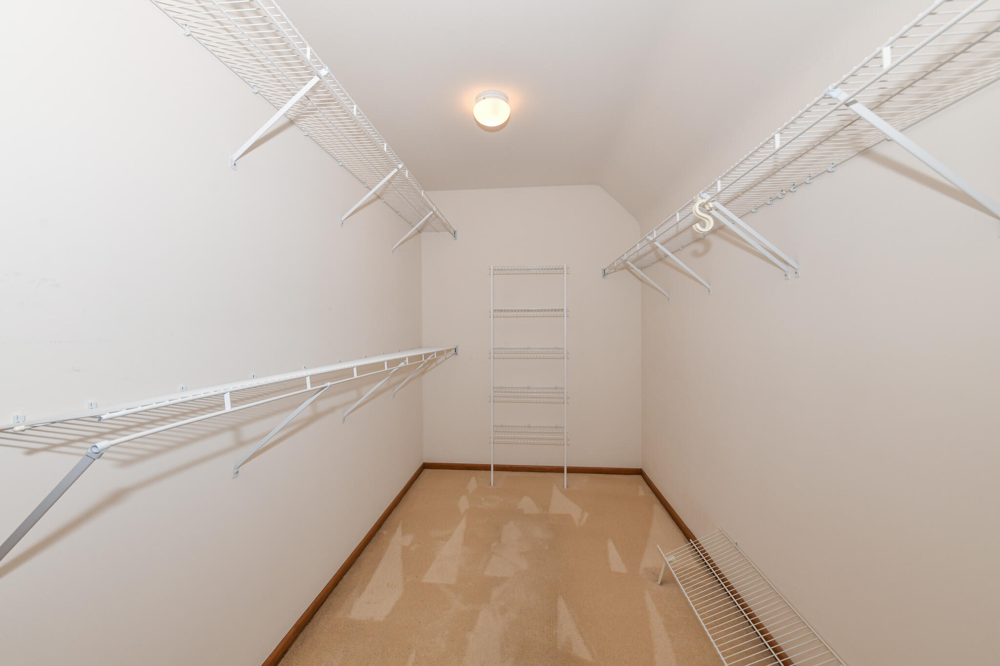 655 Mac Henry Circle, Unit B Brookfield, WI 53045 - Photo 26 of 36 Primary BR Closet