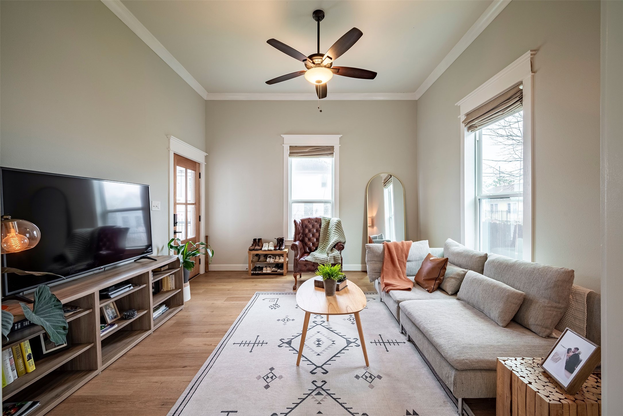 1924 Gano Street Houston, TX 77009 - Photo 1 of 18 a living room with furniture and a flat screen tv
