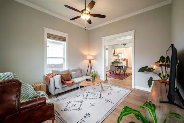 a living room with furniture and a window