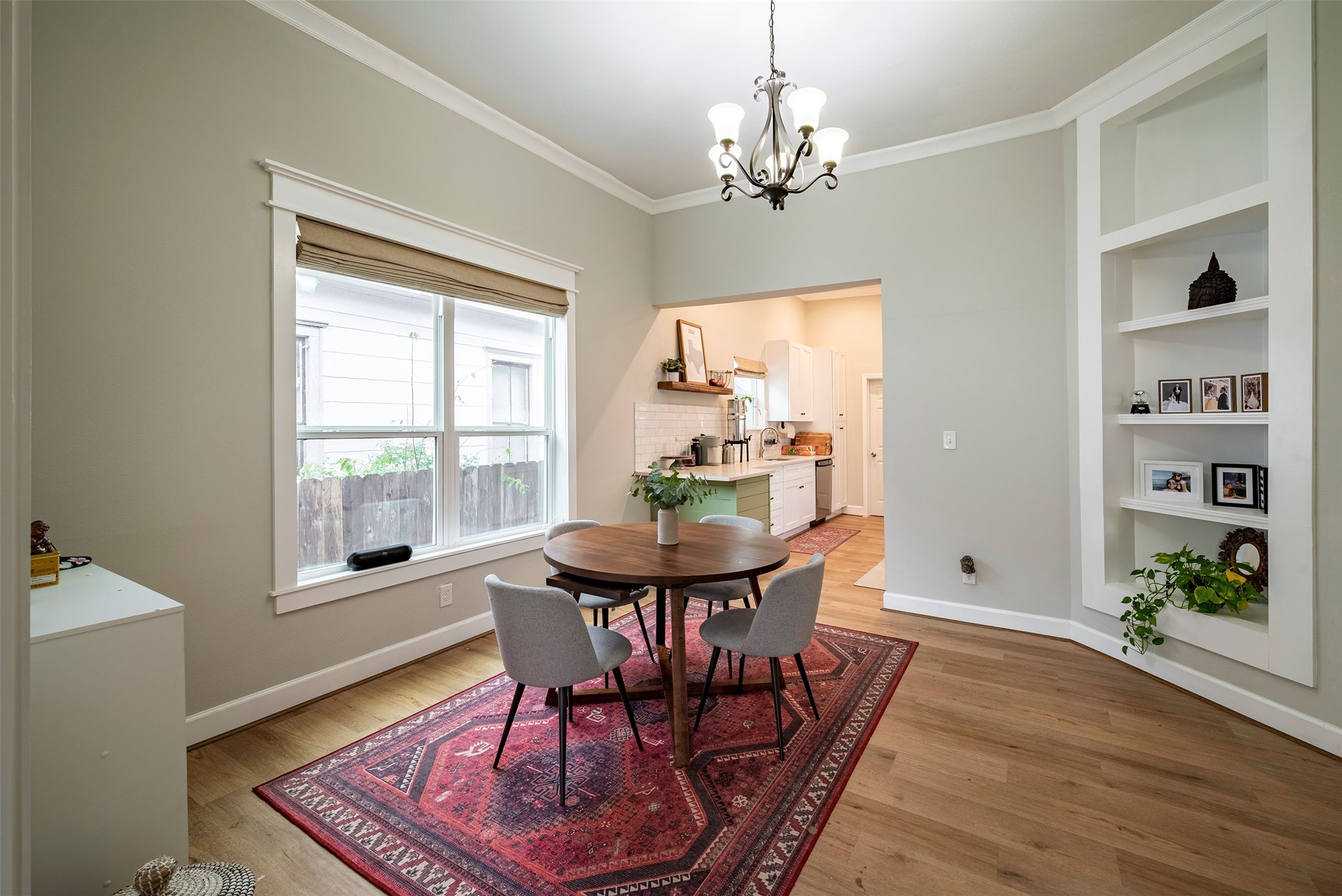 1924 Gano Street Houston, TX 77009 - Photo 4 of 18 a view of a dining room with furniture window and wooden floor